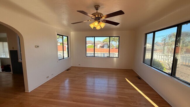 Building Photo - This two-bedroom, one-bath home in Upper Seaside