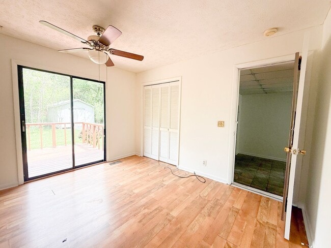 Building Photo - 2-Bedroom Home with Bonus Room & Large Wooden Deck | Pet-Friendly Near I-40 & City Lake