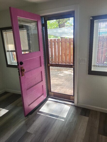 door to patio off bedroom 2 - 703 N Walnut St
