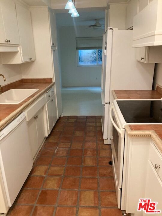 Building Photo - 1203 N Sweetzer Ave