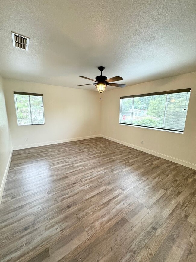 Building Photo - Spacious Solar-Powered 4-Bedroom, 3-Bath Home with Vaulted Ceilings & Tons of Storage! SEE VIDEO
