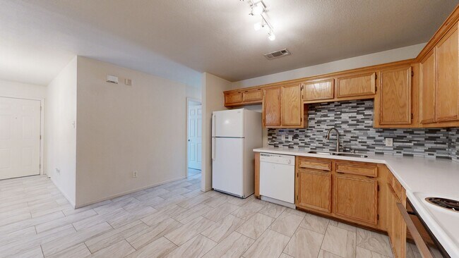 Building Photo - ALL TILE 3 BEDROOM DUPLEX ONLY $1,350 BY A...