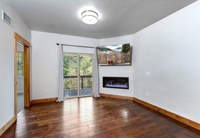 Building Photo - Unfurnished Condo Retreat with Modern Comf...