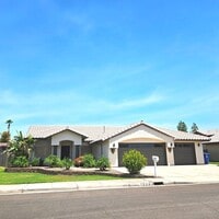 Building Photo - Pool home available now!