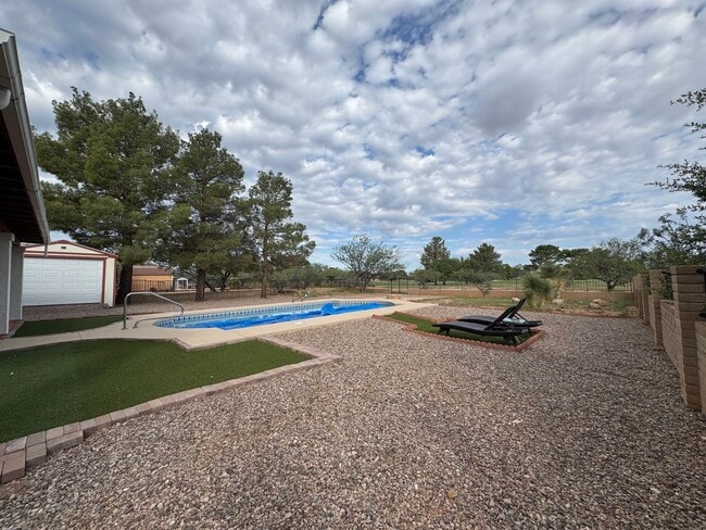 Building Photo - 3BR/2BA/2CG, 1836 sq.ft. rental with POOL ...
