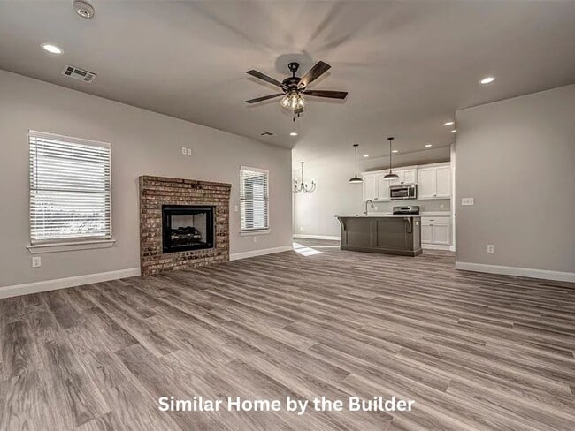 Building Photo - Spacious 4-Bedroom Home with 3-Car Garage in Yukon!