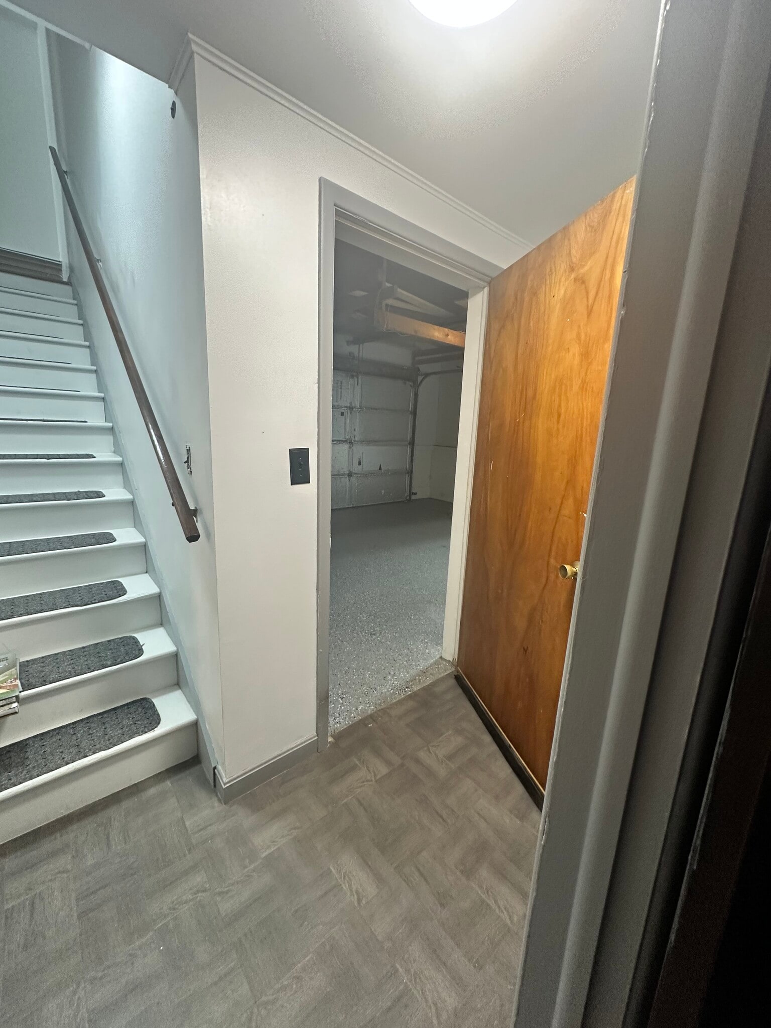 Stairs and attached garage - 142 Bunker Hill Cir