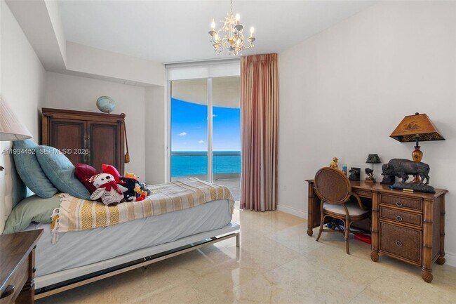 Building Photo - 16047 Collins Ave