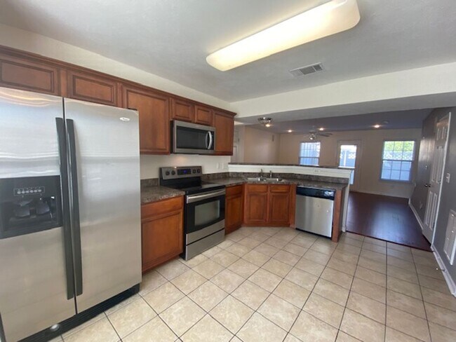 Building Photo - End Unit Townhouse Now Available at Barnes...