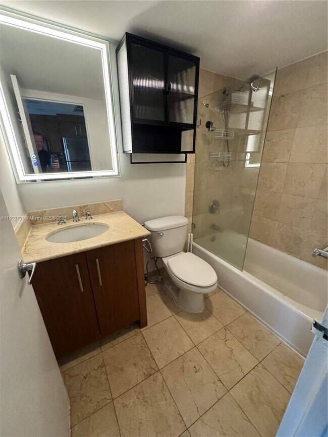 Building Photo - 10275 Collins Ave