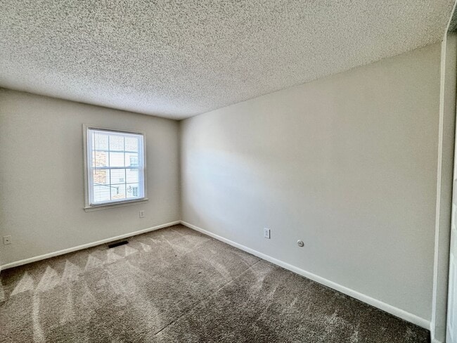 Building Photo - READY NOW!! Fenced Patio - Pet Friendly - Over 1,500 Square Feet!!