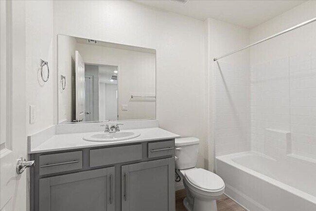 Building Photo - Modern 4-Bedroom Home with Turf Backyard in Gated Community