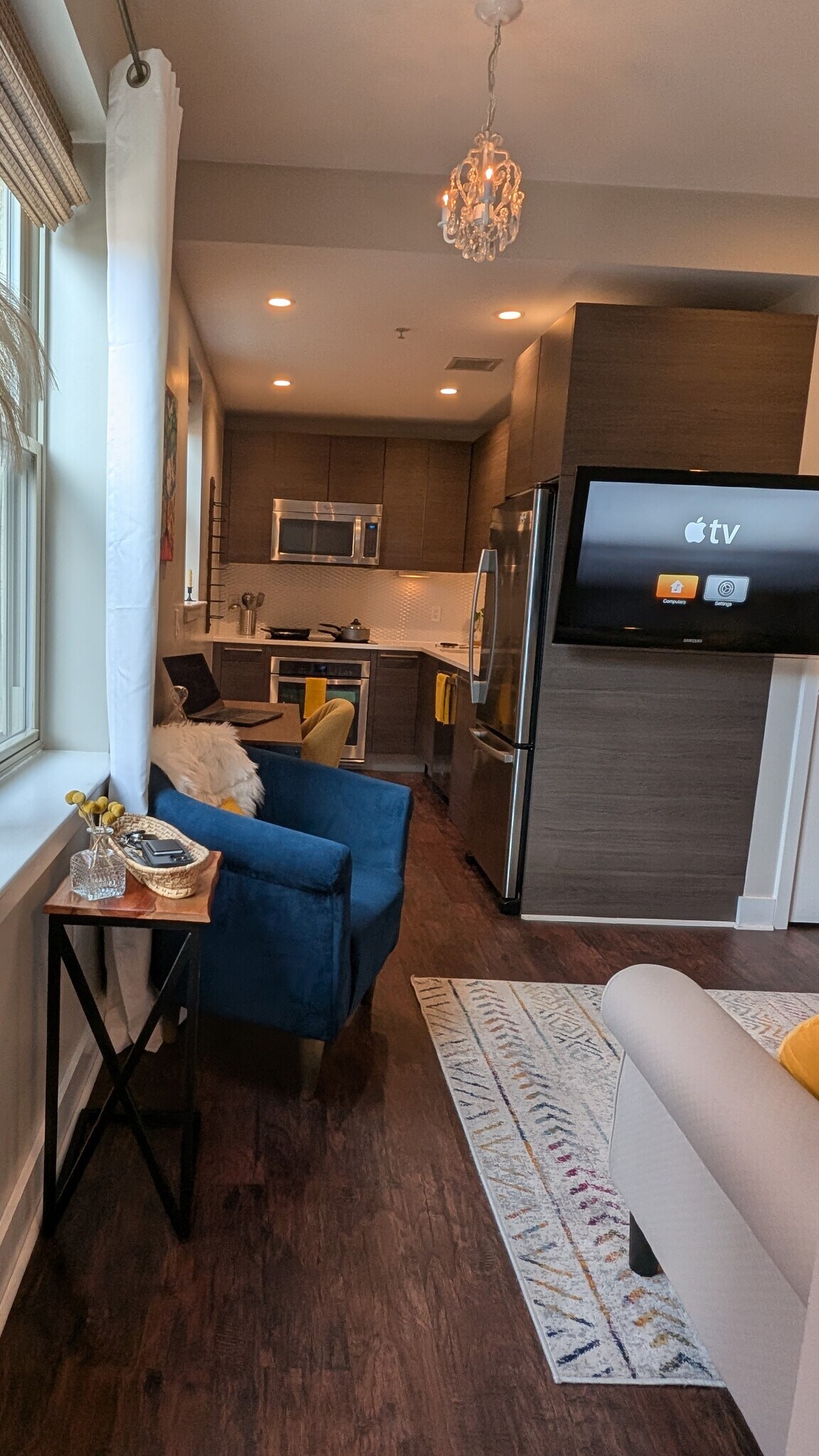 Arm chair, desk and office chair in living room/kitchen - 3606 Rock Creek Church Rd NW