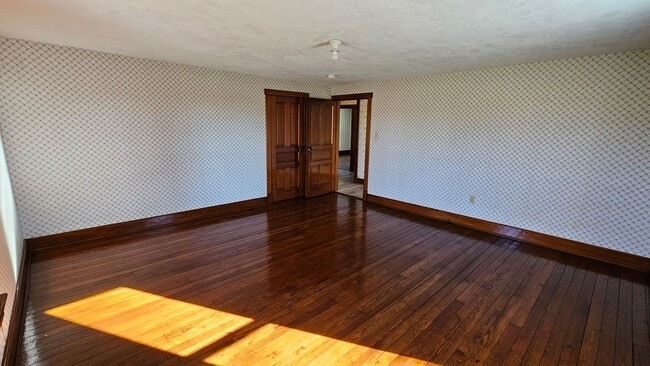 Building Photo - Country Living in This 4 Bedroom Farmhouse!