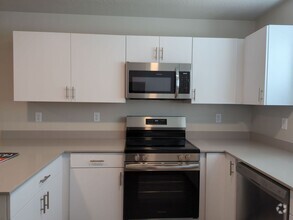 Building Photo - Brand New 2 Bedroom Condo. Pet Friendly!