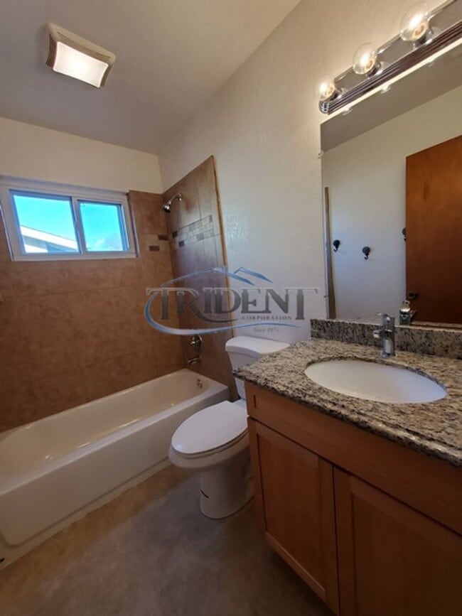 Building Photo - This is a cute 4 bedroom, 2 bath house in an established Woodland community