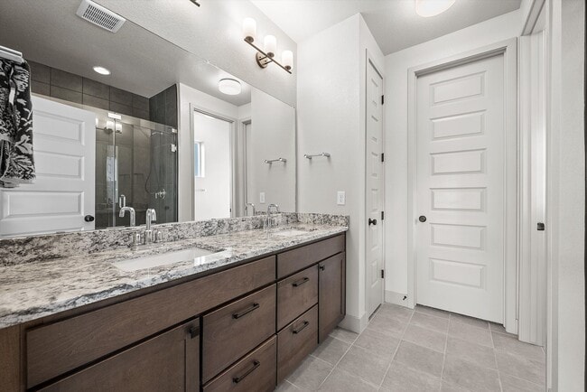 Building Photo - New-Build Paired Home with Dual Primary Suites, Finished Basement & Mountain Views