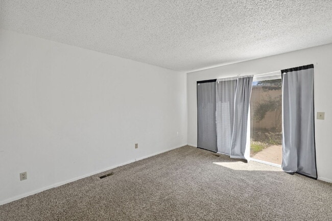 Building Photo - Close to Fort Carson and Cheyenne Mountain, 3 bedroom townhome with 2 car garage.