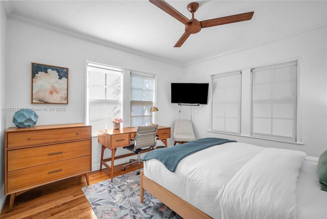 Guest bedroom with desk & TV - 1109 NE 3rd St