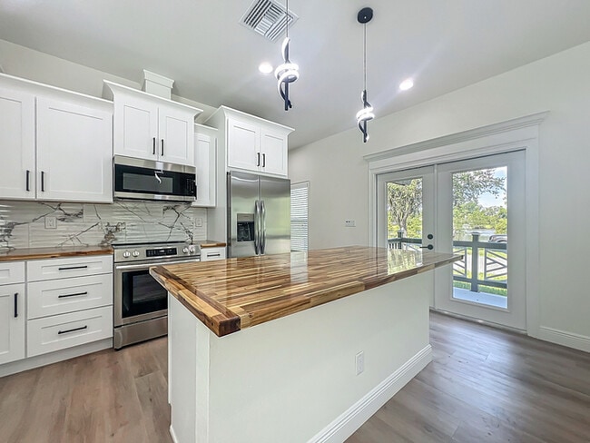 Building Photo - BRAND NEW CONSTRUCTION in the Heart of Pla...
