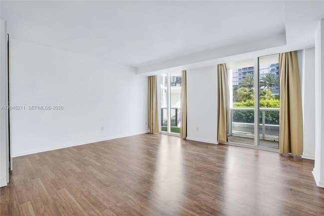 Building Photo - 10275 Collins Ave