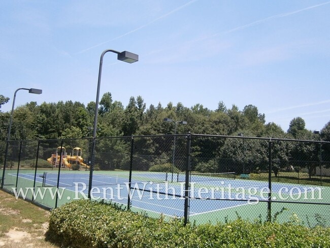 Building Photo - WOW!!...GORGEOUS HOME/HARDWOOD FLOORS/ UPGRADES GALLORE / SWIM - TENNIS