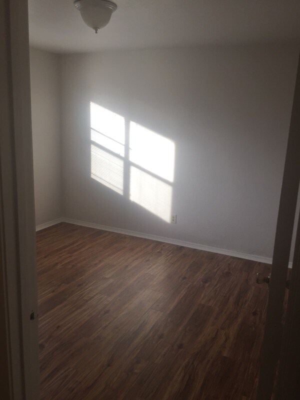 Second Bedroom with Golden Acacia Luxury Vinyl Plank. - 428 Kays Ln