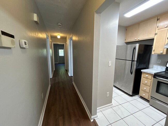 Building Photo - 2BR/2BA Townhome. BRAND NEW FLOORS