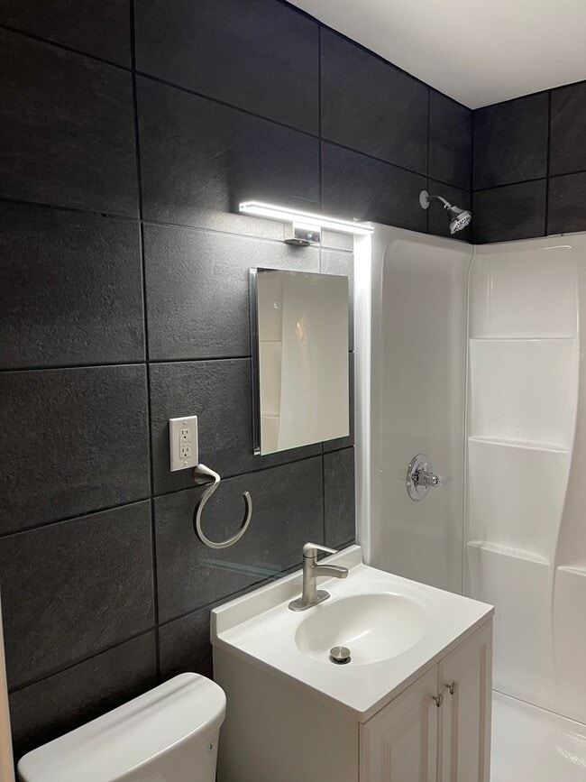 Building Photo - Newly Renovated 4-Bedroom Ranch with Basem...