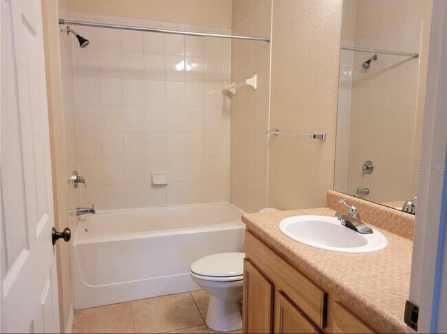 Building Photo - 10213 Courtney Palms Blvd