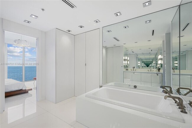 Building Photo - 6899 Collins Ave