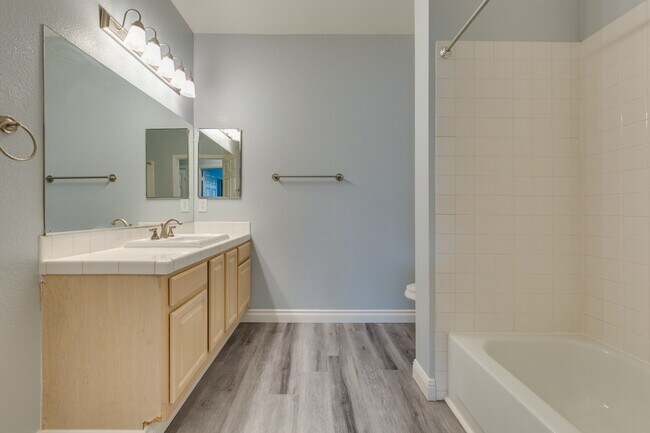 Building Photo - Spanish Palms a Guard Gated Community