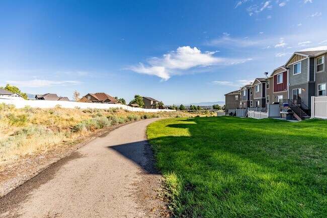 Building Photo - Comfort Meets Convenience in This Herriman...