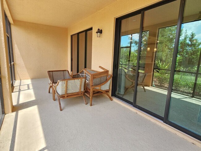Building Photo - Annual Unfurnished 2 Bedroom 2 Bathroom First Floor Condo with 1 Car Garage in Sarasota National!