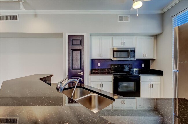 Building Photo - 9750 Lake Chase Island Way