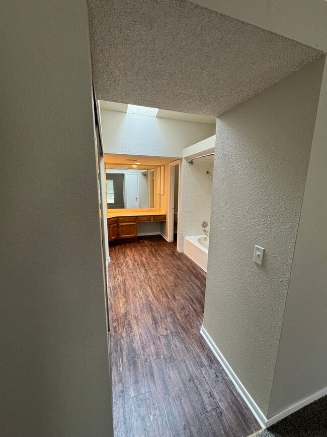 Building Photo - NICE 3 BEDROOM FEATURING WOOD VINYL PLANK ...