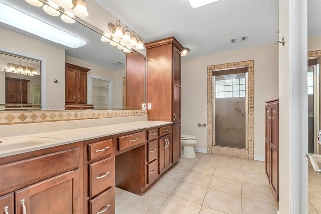 Building Photo - 4BR/3BA Updated Home – Quiet Cove + Fenced Yard!