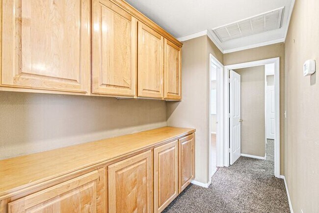 Building Photo - Spacious 4-Bedroom Home with Fireplace, 3-Car Garage & Great Backyard