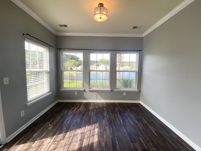 Building Photo - Three Bedroom Home with fenced-in Backyard oasis!