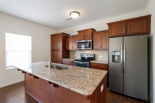 Building Photo - Charming and Spacious 4-Bedroom Home with Two Car Garage, located in Morrisville!