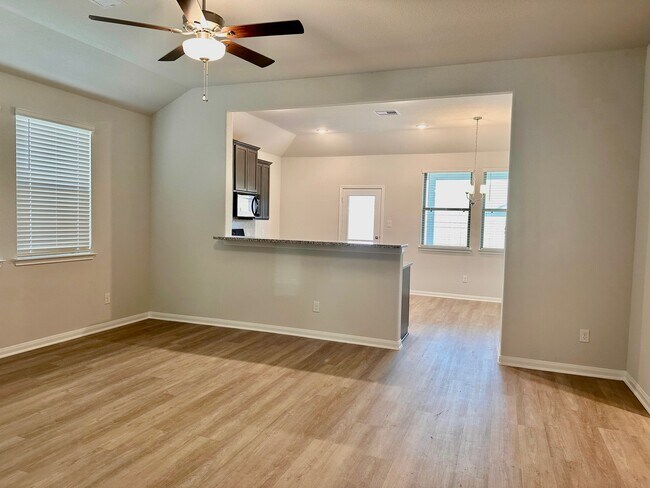 The kitchen is open to the living room for effortless entertaining! - 507 Turtle Dove Dr