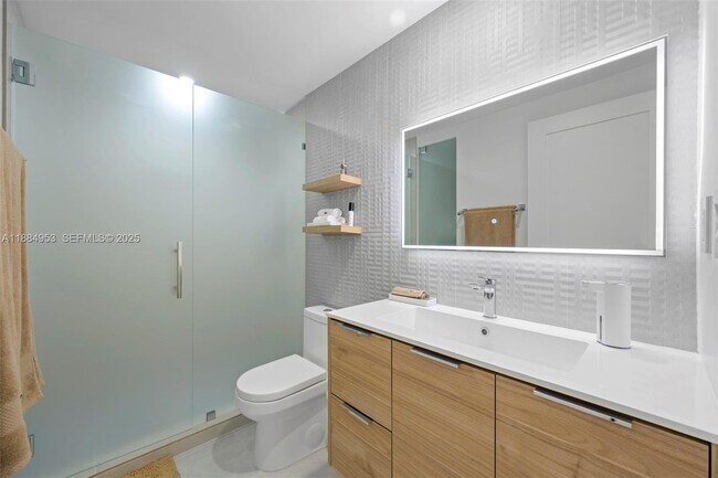 Building Photo - 19370 Collins Ave