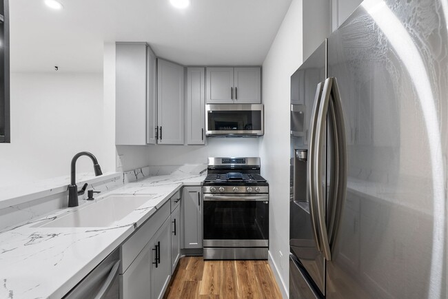Building Photo - Renovated 1 Bedroom Condo Overlooking Creek