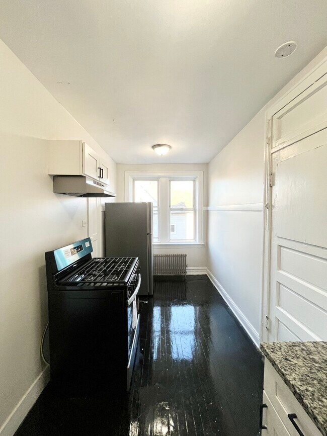 Building Photo - 4126 W 24th Pl