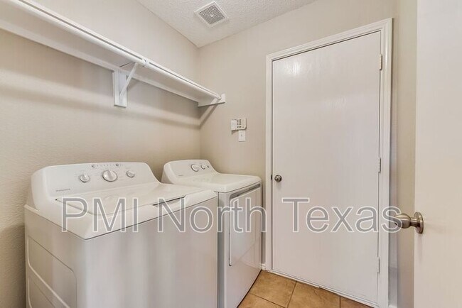 Building Photo - 9957 George Bush Dr