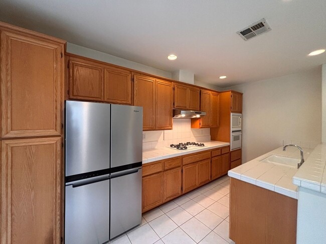 Building Photo - Great 4B/2.5BA House in Gate Community in ...
