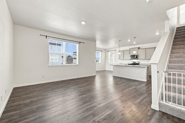 Building Photo - Spacious 4 Bedroom, 2.5 Baths in Bennett! 3 Car Attached Garage. Corner Lot!