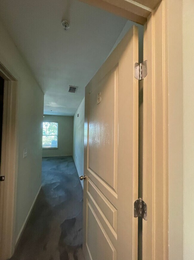 Building Photo - Two Bedrooms Available in this Three Bedroom Flat, Female Applicants!