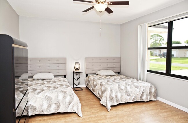 2 full size beds in Bedroom #4 - 722 SE Thanksgiving Ave