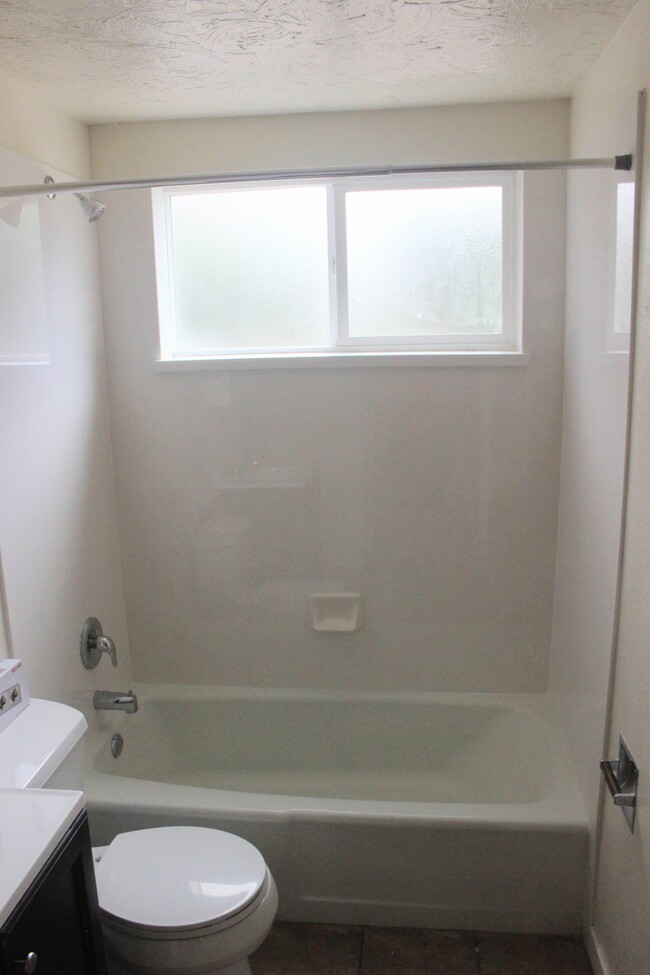 Bath tub and shower. - 338 E 1600 S